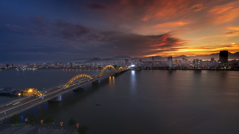 Da Nang Dragon Bridge illuminated at night over the Han River