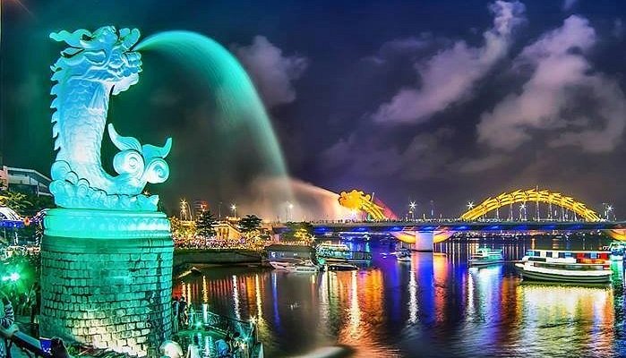 Han River night cruise Da Nang with illuminated bridge
