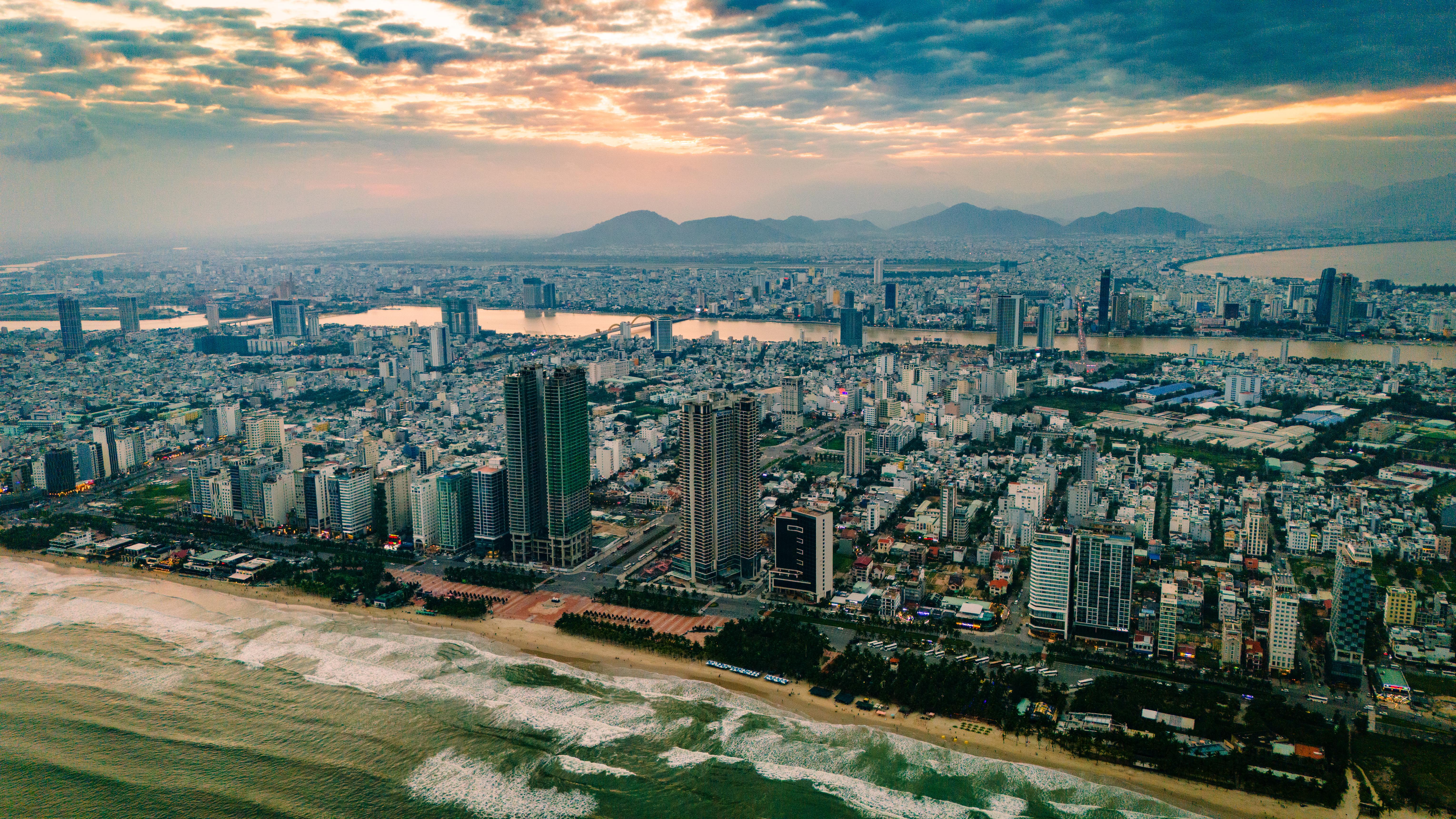 Da Nang aerial view at golden hour showing coastline and city