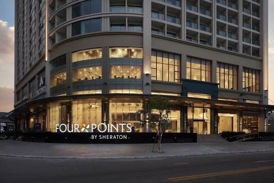 The Four Points by Sheraton Danang building entrance at dusk