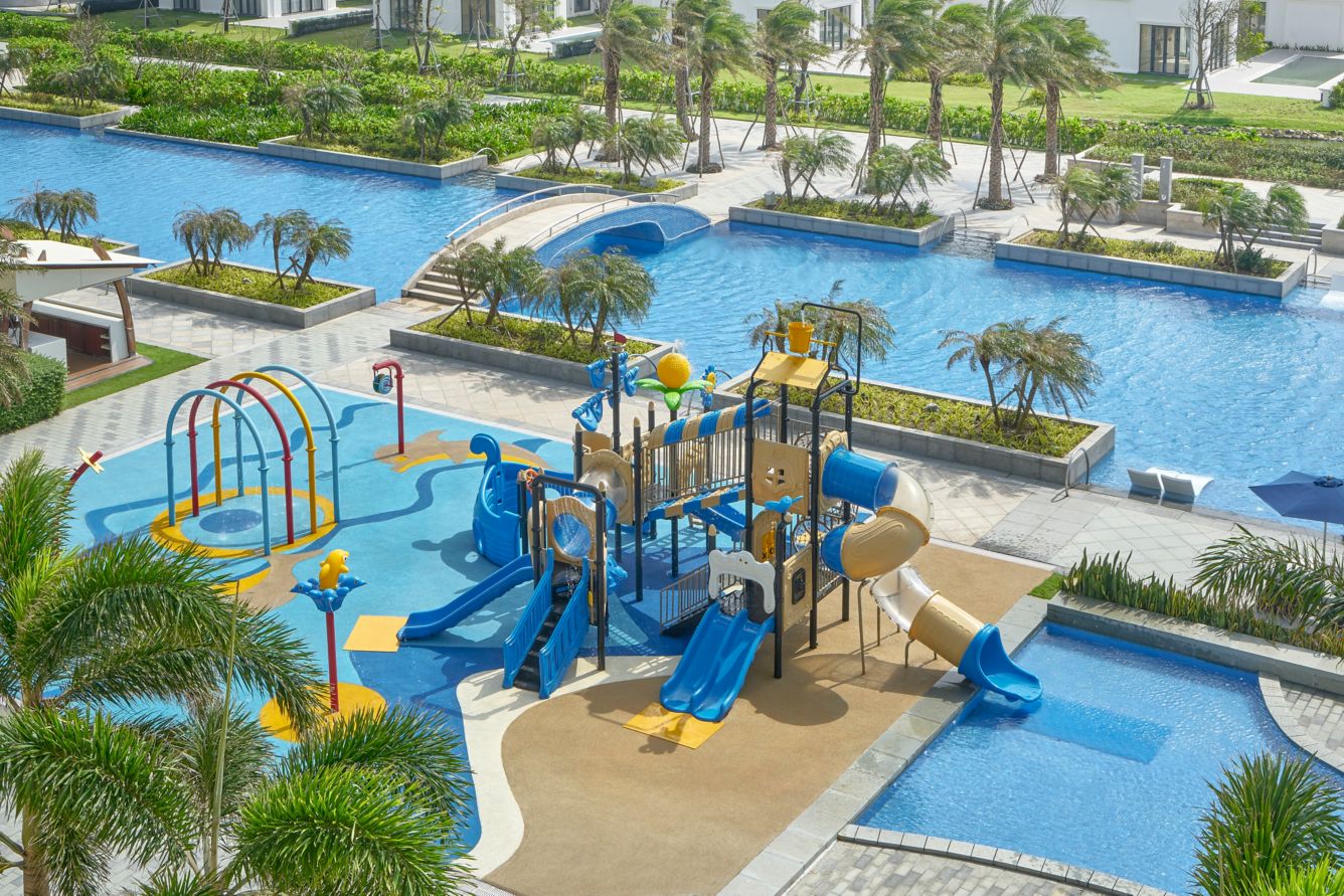 Sheraton Grand Danang Resort pool complex with dedicated kids' water play area